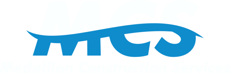 A logo of the construction company mg.